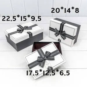 Коробка 22,5*15*9,5 см с бантом белый/черный