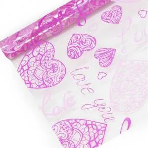 Упак.пленка 50гр (0,7*8м) Любовь (ажурные сердца), малиновый/розовый 73011