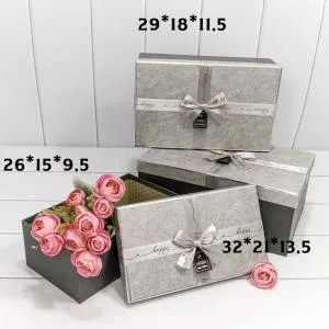 Коробка 32*21*13,5 см "Happy" с бантом серебро