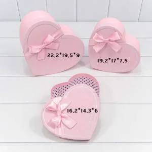 Коробка 19,2*17*7,5 см сердце с бантом розовая
